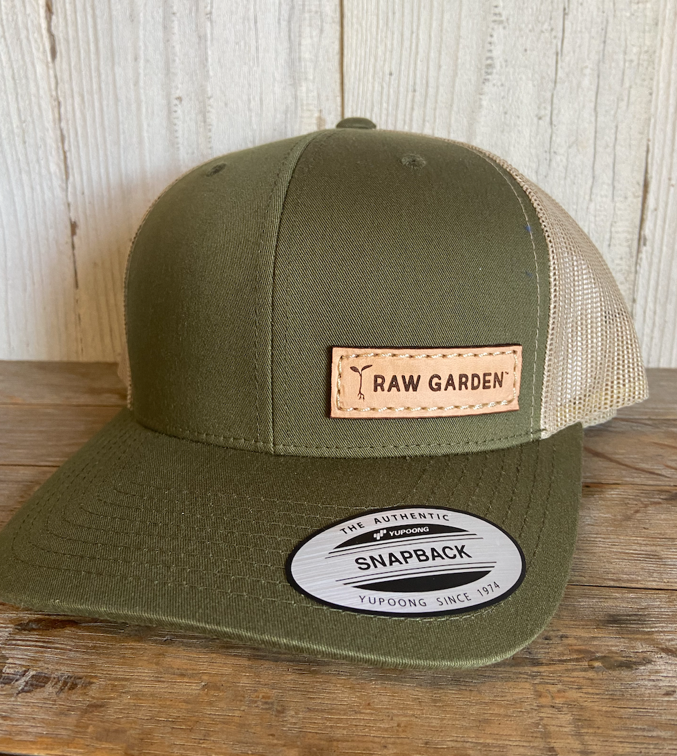 Green Raw Garden with leather patch on wood