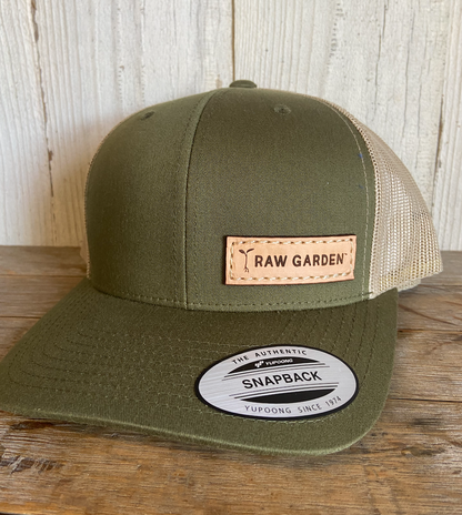 Green Raw Garden with leather patch on wood 
